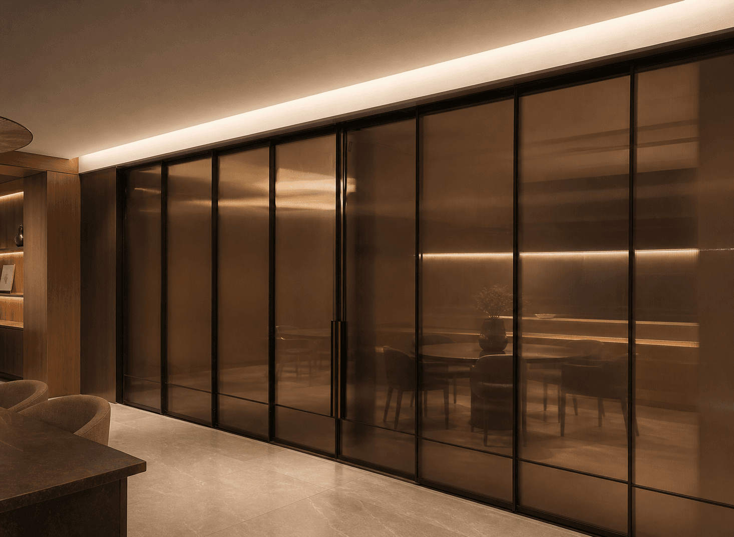 Warm Metal & Smoked Glass Interiors